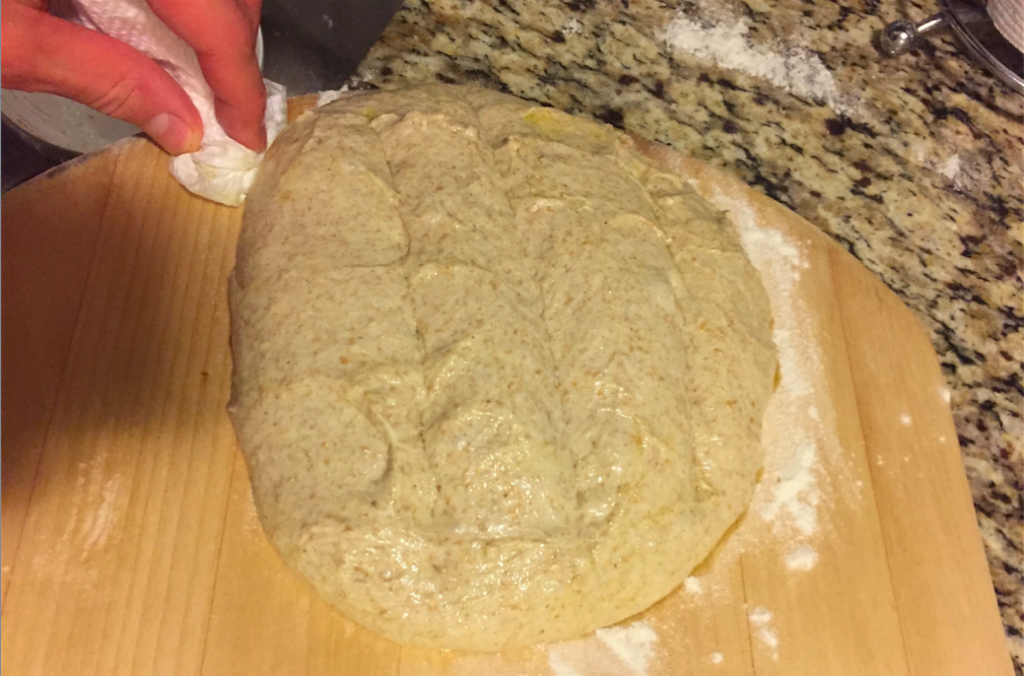 wiping-the-flour-sourdough-bread